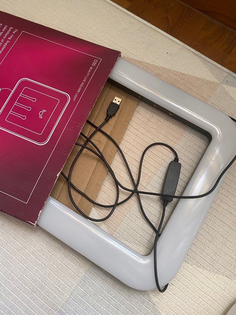 Square Ring Light (Category: Other Gadgets) located in Singapore. Submitted by chirockee (Listing ID 1318490201, Image 1). Description: Used once for a wedding..
