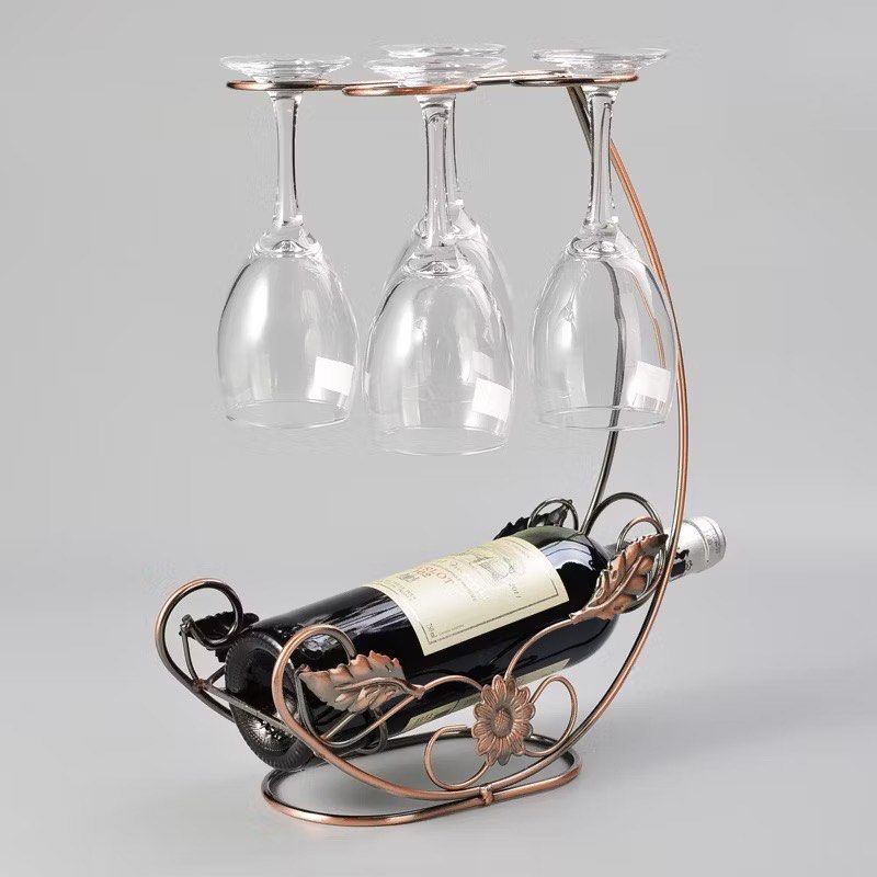 Wine Rack Stemware Holder | Kitchen Organizer, Elegant Metal Countertop Decor (Category: Wine Cellar & Storage) located in Paranaque City. Submitted by homefashionbymaple (Listing ID 1318592327, Image 3). Description: Description: 🔹 1 x wine rack ( not including bottle and wine glass),10.5 x 6.3 x 14.2 inches 🔹 holds 1 full bottle and up to 4 glasses 🔹 Bronze colored Countertop storage rack, sturdy and durable, not easy to deformation. ♦️No is