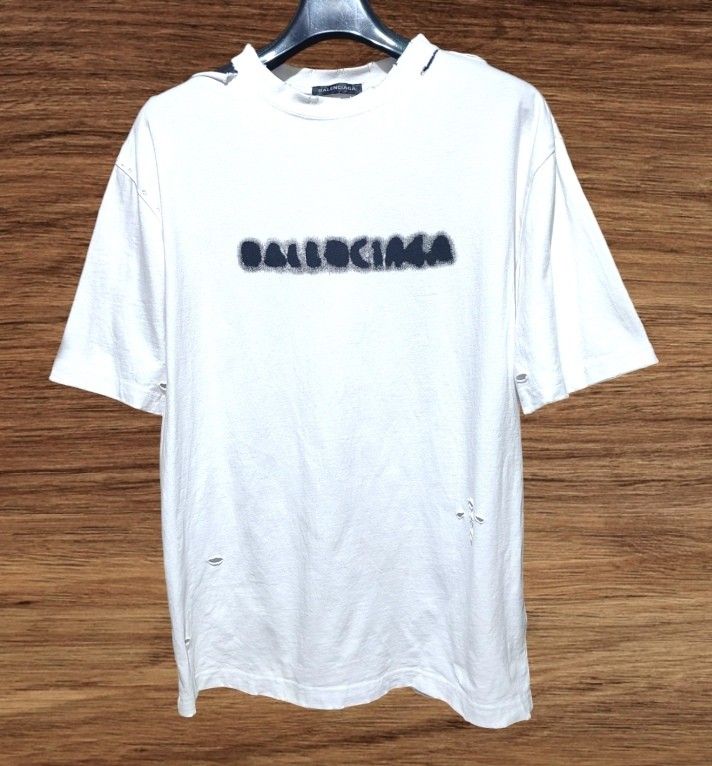 Authentic rare! balenciaga blurred & distressed white shirt (Category: Luxury Apparel) located in Donsol. Submitted by saksthriftavenuebyluckymaria8 (Listing ID 1318770845, Image 3). Description: size s fits L made in Portugal chest 21in length 26in armhole 9in shoulder21in excellent used condition cotton stretchable balenciaga Japan Co Ltd Akasaka Minato-ku tokyo For Japan use only.