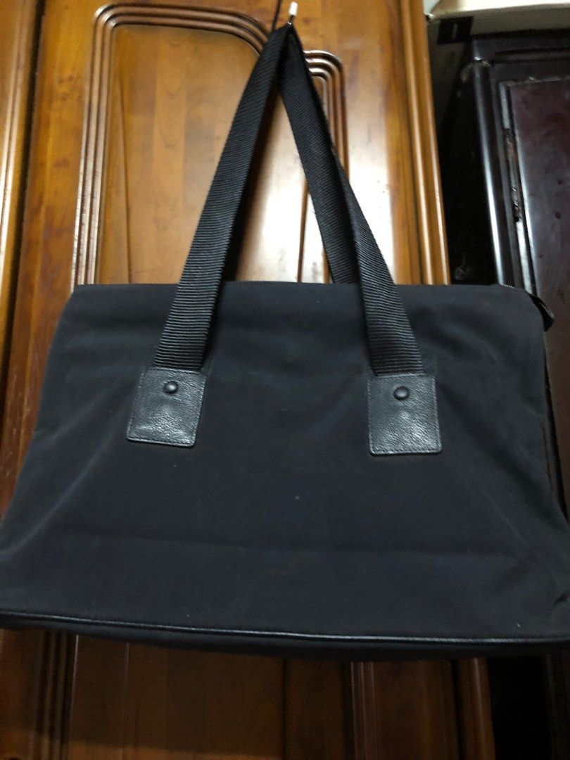 Authentic Via della Spiga laptop/document/business bag (Category: Luxury Bags & Wallets) located in Los Banos. Submitted by profemy (Listing ID 1318707260, Image 2). Description: beautiful authentic Via della Spiga Lavoro business/laptop bag. 48 cm at the widest point; 32 cm in height,13 inches bottom width The body is made of suede-like materual; flap is leather-like. inside are two large slip pockets on both sides and a zipped p0cket. The insid