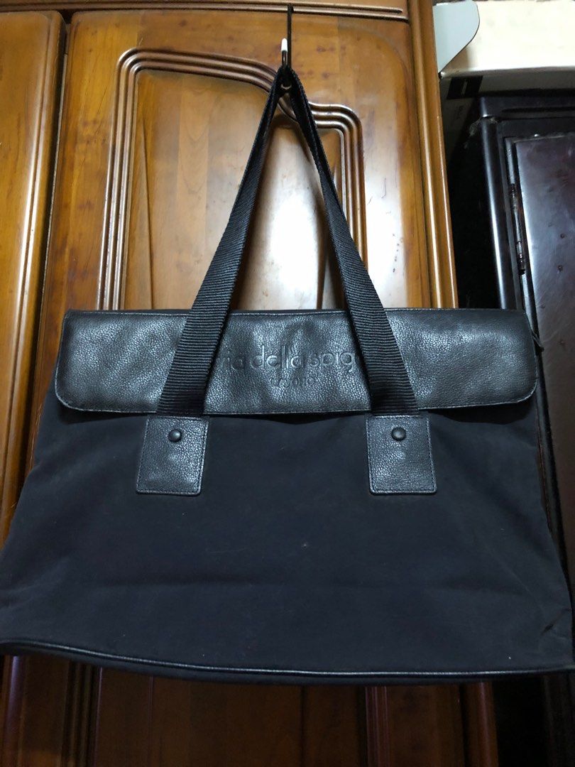 Authentic Via della Spiga laptop/document/business bag (Category: Luxury Bags & Wallets) located in Los Banos. Submitted by profemy (Listing ID 1318707260, Image 1). Description: beautiful authentic Via della Spiga Lavoro business/laptop bag. 48 cm at the widest point; 32 cm in height,13 inches bottom width The body is made of suede-like materual; flap is leather-like. inside are two large slip pockets on both sides and a zipped p0cket. The insid