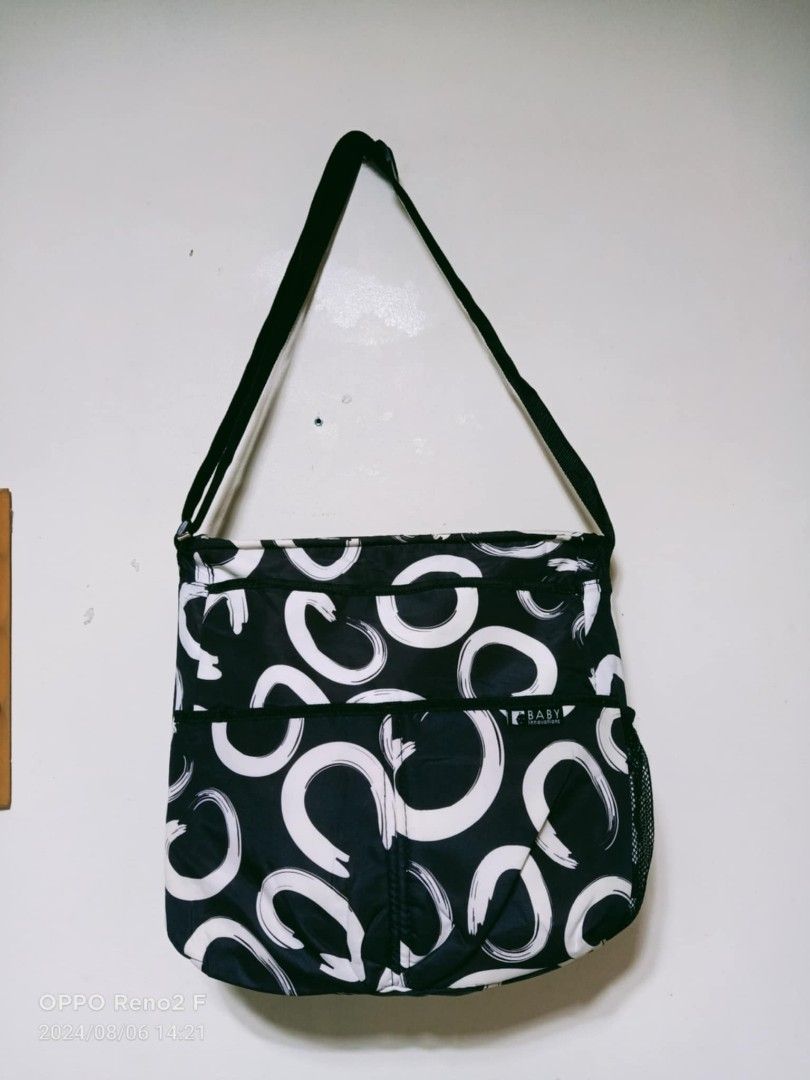 Baby Essentials (Category: Diaper Bags & Wetbags) located in Quezon City. Submitted by daisyuy1979 (Listing ID 1318647212, Image 2). Description: Never Used.