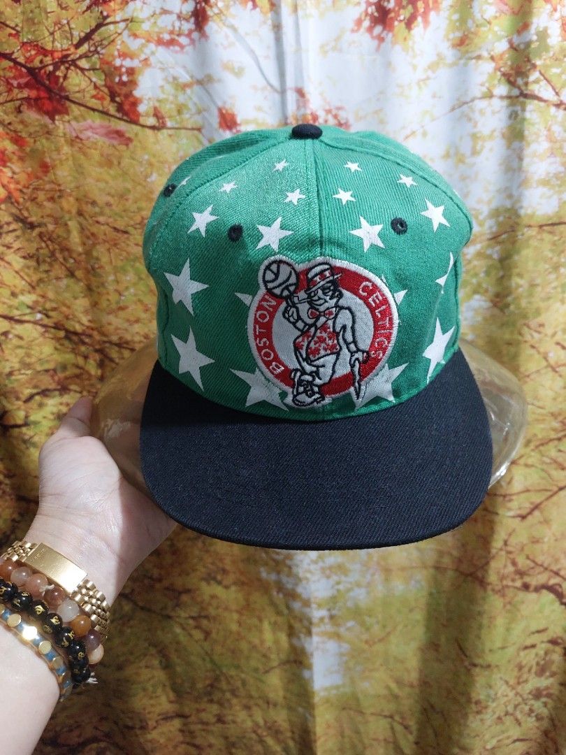 Boston Celtics Cap (Category: Caps & Hats) located in Muntinlupa City. Submitted by sakurambo_des (Listing ID 1318790955, Image 1). Description: Boston Celtics Real Fire Baseball Cap Size 57-59cm approx.measure in very good condition.