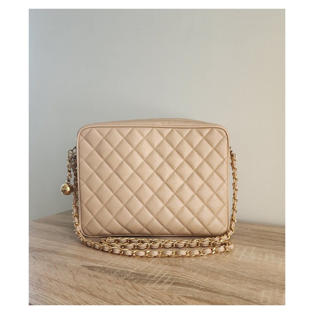 Chanel camera bag (Category: Luxury Bags & Wallets) located in Manila. Submitted by luxe88nhelmueller (Listing ID 1318642681, Image 3). Description: Pre owned In good condition Vintage Chanel Camera Bag Beige Caviar GHW Sling/ shoulder bag Series 3 Year 1994 Comes with Hologram intact, Dustbag And box.