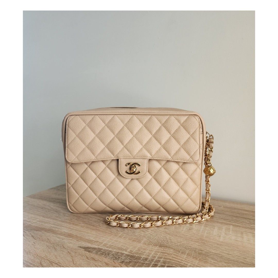 Chanel camera bag (Category: Luxury Bags & Wallets) located in Manila. Submitted by luxe88nhelmueller (Listing ID 1318642681, Image 2). Description: Pre owned In good condition Vintage Chanel Camera Bag Beige Caviar GHW Sling/ shoulder bag Series 3 Year 1994 Comes with Hologram intact, Dustbag And box.