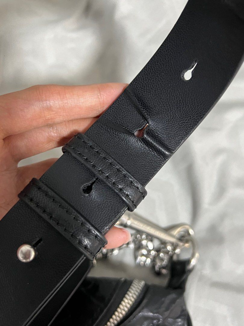 Charles & Keith Halfmoon Black Crinkled Leather Bag (Category: Cross-body Bags) located in Quezon City. Submitted by leighdeclutters (Listing ID 1318790897, Image 3). Description: ✨Used once ✨Refer to 3rd pic for the flaw ✨Otherwise, it looks brand new ✨RFS: Style is too young for me 😅.