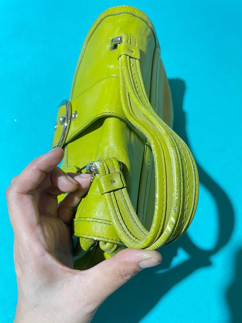 Coach (Category: Shoulder Bags) located in Pasay City. Submitted by hearty12 (Listing ID 1318727796, Image 3). Description: Color Lime Green. Kili bag can fit iphone pro and small umbrella. Length-10 inches Height-7 inches.
