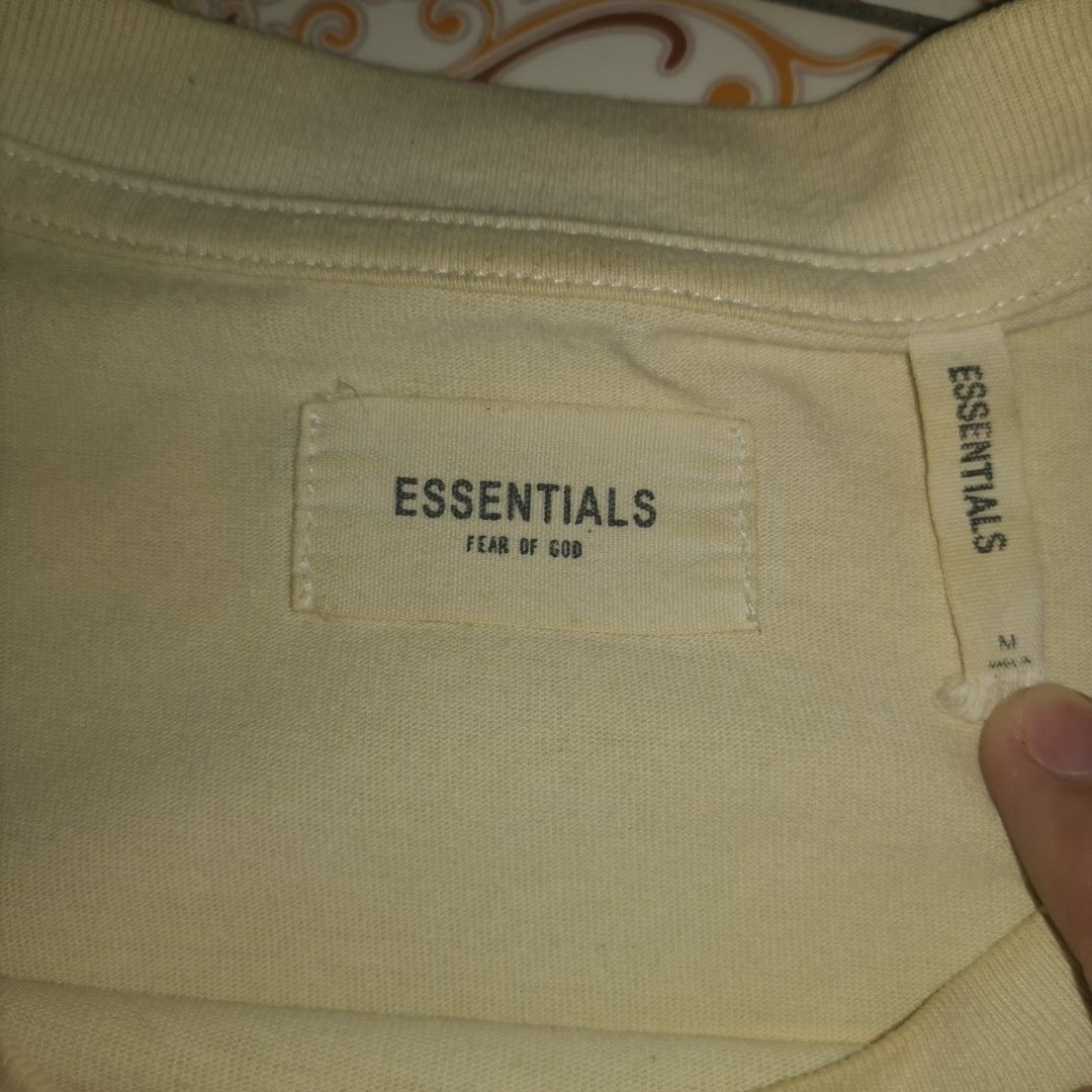 Fear Of God Essentials T-shirt (Cream Yellow) Medium (fits best Large) L26 x W23 (Category: Tshirts & Polo Shirts ) located in Silang. Submitted by hundred_lives (Listing ID 1318632274, Image 2). Description: Fear Of God Essentials T-shirt (Cream Yellow) Medium (fits best Large) L26 x W23.