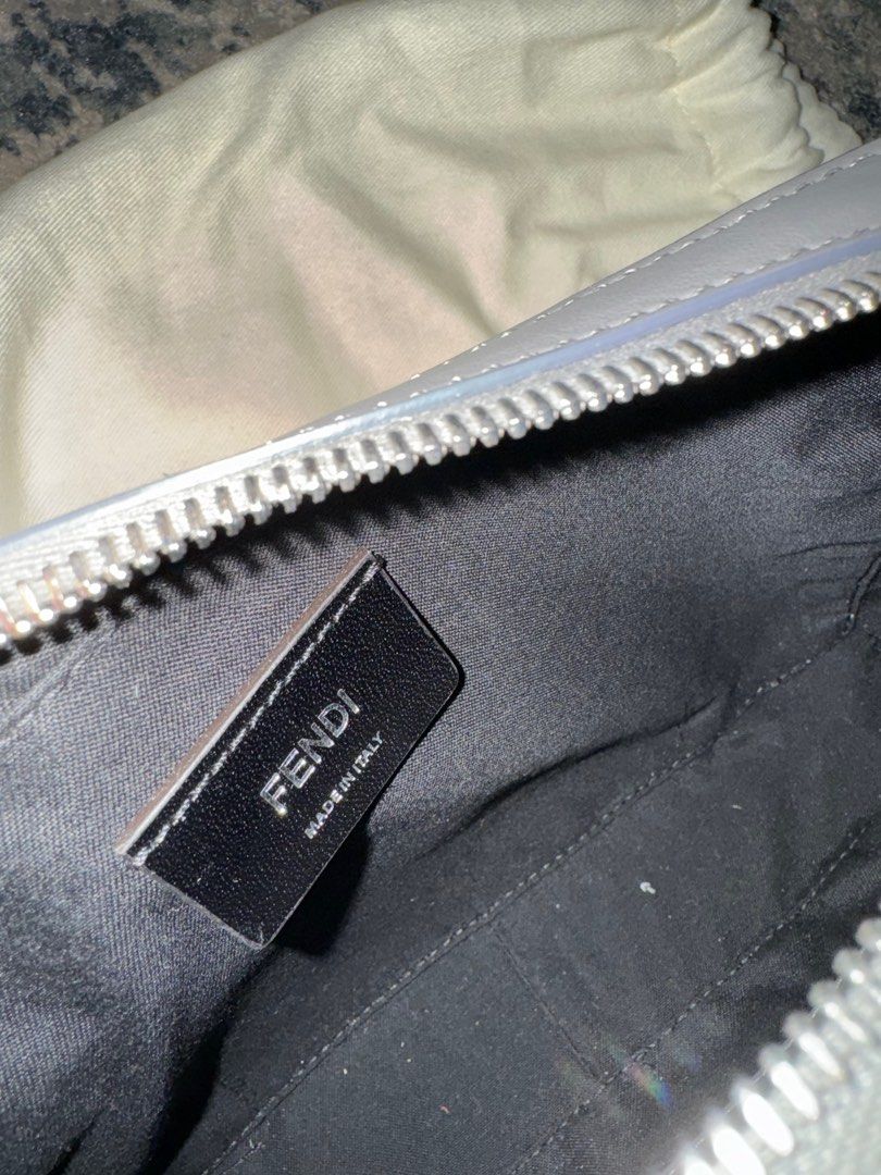 Fendi Diagonal Camera Bag (Category: Luxury Bags & Wallets) located in Pasig City. Submitted by starluxeph (Listing ID 1318650767, Image 3). Description: Fendi Diagonal Camera Case Multicolor leather bag Compact shoulder bag made of beige leather and fabric with FF motif. Embellished with dark brown leather diagonal insert. Zipper fastening and lined interior, palladium-finish metalware. The cross-body strap is adjustable and detachable. Made in 
