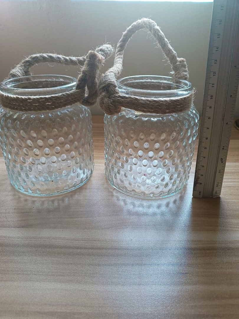 Glass Candle holder with rope (2pcs) (Category: Other Home Decor) located in Rodriguez. Submitted by tjcookie420 (Listing ID 1318673817, Image 2). Description: thick glass candle holder with thick rope take both for 200 pesos only dimension in 2nd pic MOD: same day delivery only sf c/o buyer.