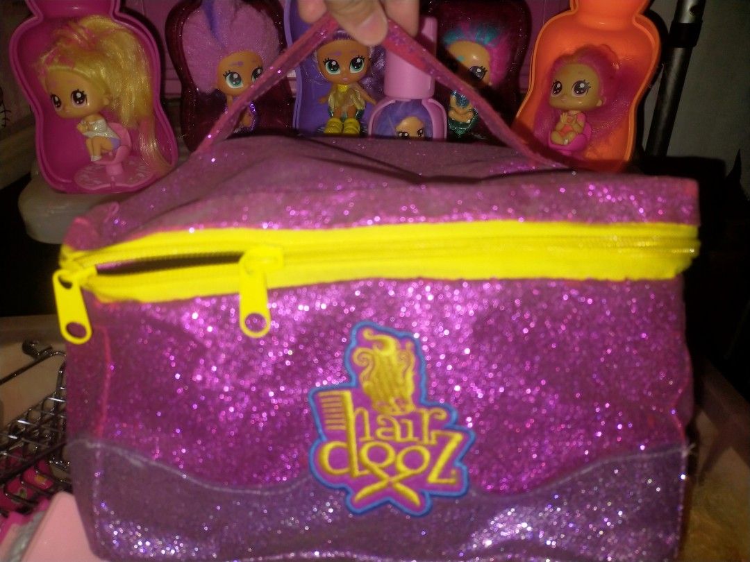 Hair dooz dolls SET (Category: Kids Toys) located in Manila. Submitted by febreroash31040 (Listing ID 1318654184, Image 1). Description: set @1000.00 you can get a totally 6 doll with accessories and the carry on bag.
