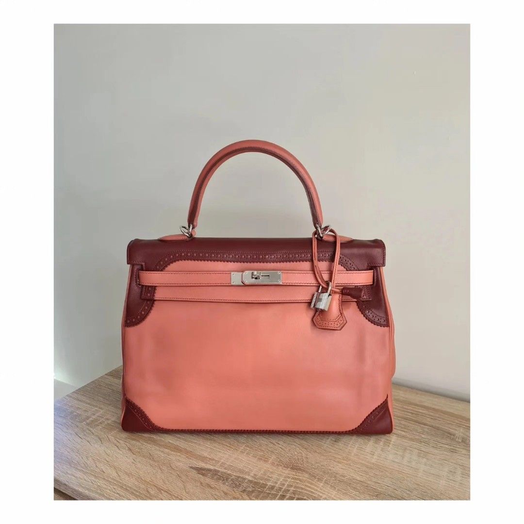 Hermes Kelly 35 Ghillies (Category: Luxury Bags & Wallets) located in Manila. Submitted by luxe88nhelmueller (Listing ID 1318646094, Image 1). Description: Available on hand Pre owned Hermes Kelly 35 Retourne Ghillies Rosy and Rouge H combination Veau Swift Leather PHW Stamp P Year 2012 Comes with Shoulder strap, Clochette, Lock, keys And dust bag.
