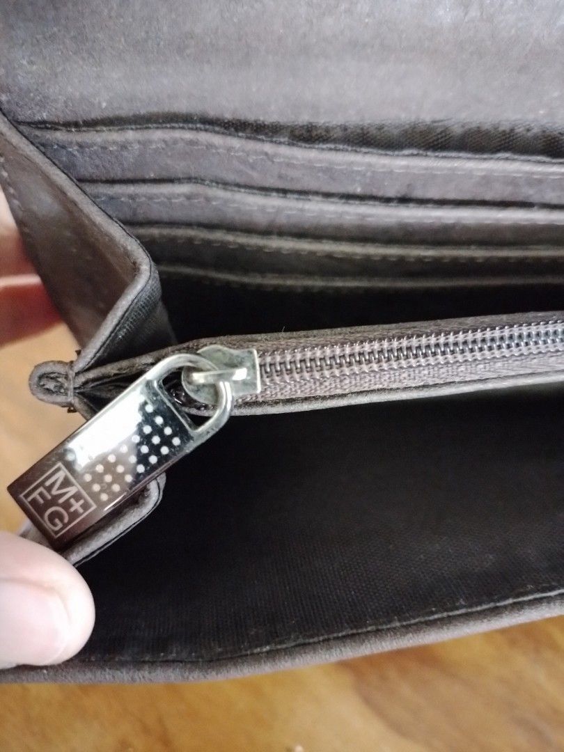 Marithe Girbaud black leather wallet (Category: Wallets & Card holders) located in Bislig. Submitted by cessg (Listing ID 1318641444, Image 3). Description: Seldom used..