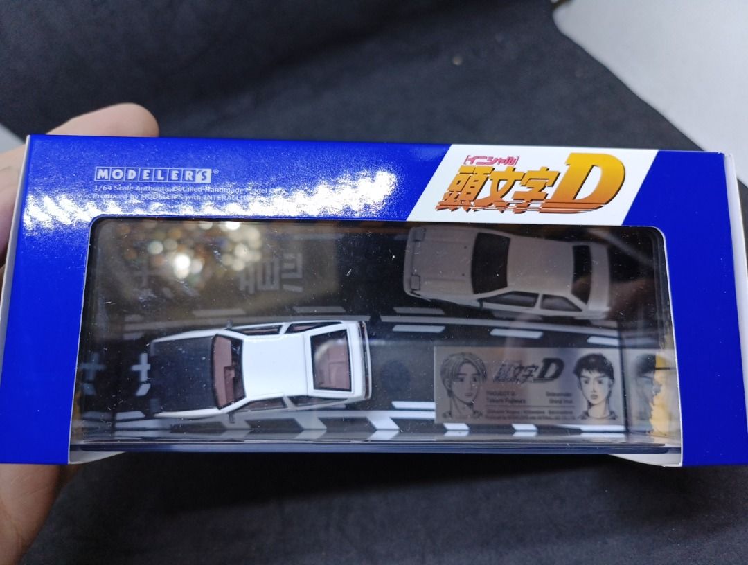 Modeler's Initial D 1/64 2 Pack Sets - Price is per volume (Category: Vehicle & Diecast Models) located in Quezon City. Submitted by b.it.toys (Listing ID 1318725769, Image 2). Description: Initial D Set Vol.11 Toru Suetsugu Roadster (NA6CE) & Atsuro Kawai Skyline (ER34) - 3,500 Initial D Set Vol.13 Kyoko Iwase RX-7 (FD3S) & Project D Support Car (Nissan Vanette Van) - 3,500 Initial D Set Vol.1 Takumi Fujiwara Trueno (AE86) & Shinji Inui Trueno 2