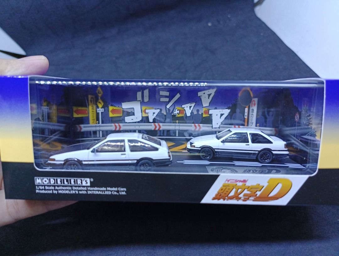 Modeler's Initial D 1/64 2 Pack Sets - Price is per volume (Category: Vehicle & Diecast Models) located in Quezon City. Submitted by b.it.toys (Listing ID 1318725769, Image 1). Description: Initial D Set Vol.11 Toru Suetsugu Roadster (NA6CE) & Atsuro Kawai Skyline (ER34) - 3,500 Initial D Set Vol.13 Kyoko Iwase RX-7 (FD3S) & Project D Support Car (Nissan Vanette Van) - 3,500 Initial D Set Vol.1 Takumi Fujiwara Trueno (AE86) & Shinji Inui Trueno 2