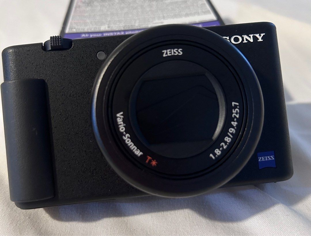 Sony ZV1/ZV-1 (Category: Cameras) located in Manila. Submitted by lynn901110 (Listing ID 1318633556, Image 1). Description: Used less than 10 times Comes with: - camera unit - 64gb card - original battery + extra battery - leather case - Sony sgr-1 grip - cable charger - deadcat furry windshield * doesn’t come with original box SF borne by buyer .