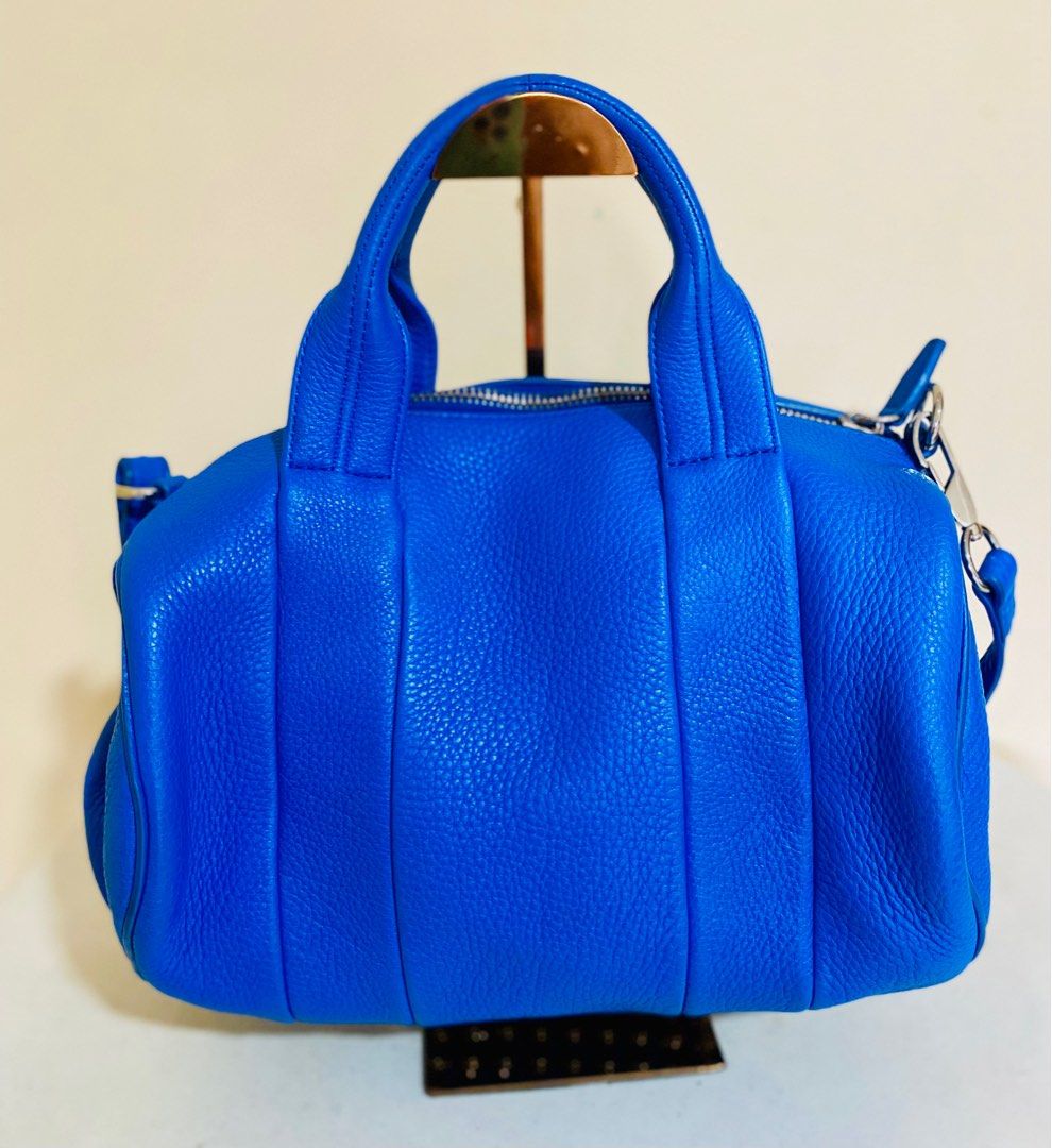 Alexander Wang (Category: Luxury Bags & Wallets) located in Quezon City. Submitted by acepangili29109 (Listing ID 1318822516, Image 1). Description: ♦️Alexander Wang Rocco top handle and sling Bag Lambskin pebbled Leather ♦️Rank 9.5/10 Like New ♦️Inclusions: dust bag, card care and sling strap ⚠️The price is slightly negotiable for sure Buyers Only. ♦️Payment Methods: Cash; G cash, Credit Card and Bank Transfer..