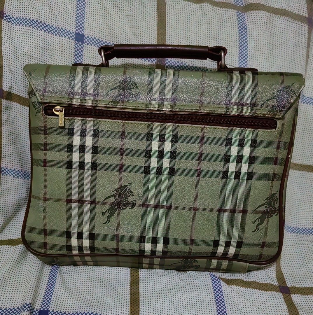 Authentic Burberrys Document bag (Category: Luxury Bags & Wallets) located in Tanza. Submitted by prelovedbymomzie (Listing ID 1318859535, Image 2). Description: .in good condition .with normal signs of usage .nylon lining with embossed burberry logo .can fit A4 size bond paper .ykk zip .rare color .SALE!!!.