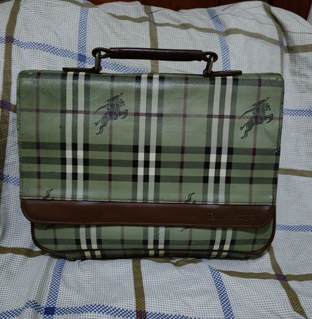 Authentic Burberrys Document bag (Category: Luxury Bags & Wallets) located in Tanza. Submitted by prelovedbymomzie (Listing ID 1318859535, Image 1). Description: .in good condition .with normal signs of usage .nylon lining with embossed burberry logo .can fit A4 size bond paper .ykk zip .rare color .SALE!!!.