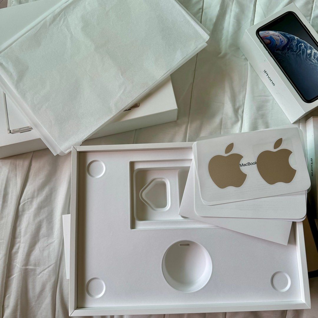 Empty Apple Boxes (Category: Other Accessories) located in Singapore. Submitted by crystalskyes (Listing ID 1318862527, Image 3). Description: selling my authentic Apple boxes that i collected, confirm authentic because i bought them from either Singtel/Apple store directly can use as gag gifts! all new and clean, but due to storage, some may have minor marks all come with their own pin/stickers 1. Macbook Air M2 2022 13.6” 16GB/512GB Laptop Box 