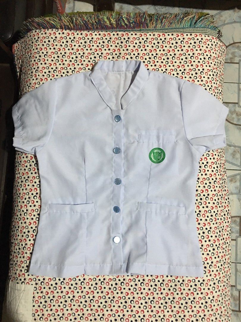 OLFU Nursing Uniform (Blouse) (Category: Others Tops) located in San Miguel. Submitted by mmizuki.ai (Listing ID 1318921921, Image 1). Description: blouse - size small - used once - kakabili lang kanina (08/08/24) rfs: bitin sakin, napansin ko lang nung sinukat ko sa bahay 😭 .