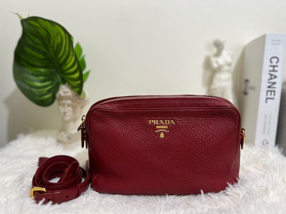 Prada Vitello Phenix Camera Bag Rubino (Category: Luxury Bags & Wallets) located in Pasig City. Submitted by r.m.c2 (Listing ID 1318928528, Image 1). Description: Prada Vitello Phenix Camera Bag Rubino 100% Authentic Bag only RFS: Decluttering MOP: GCash or BPI.