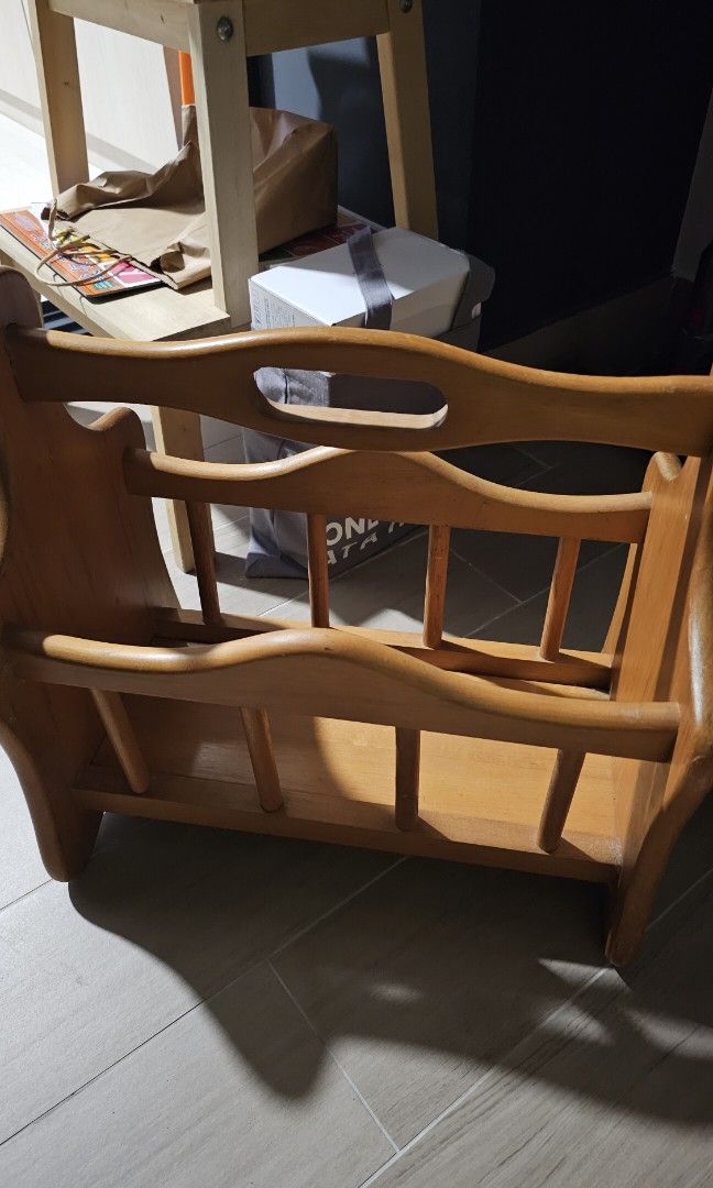 Solid Magazine Rack (Category: Shelves, Cabinets & Racks) located in Singapore. Submitted by littleyellowminion (Listing ID 1318955593, Image 1). Description: magazine rack 42cm long x 27cm wide x 41cm tall.