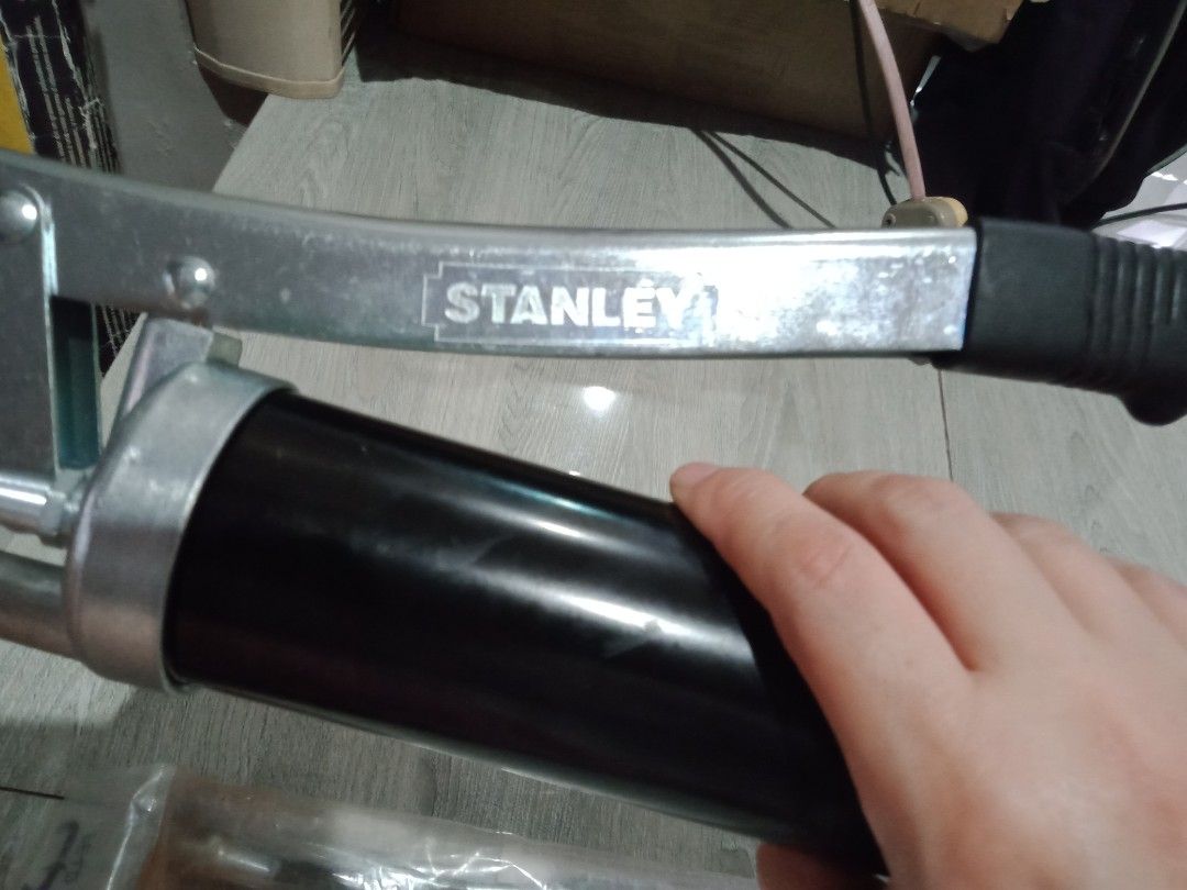 Stanley Grease Gun Original (Category: Construction Tools & Equipment) located in Manila. Submitted by PickClickShip (Listing ID 1318810058, Image 3). Description: Stanley Original Grease Gun Tool Set Original Stanley grease gun bought from US. Buy 1(complete set) @P800 or Buy 1(complete set) + Take 1 (without PSI hose) @P1100. 2nd unit with half handle (as shown in the picture) - brand Stanley - lower action grease - hose 4500psi working pressur