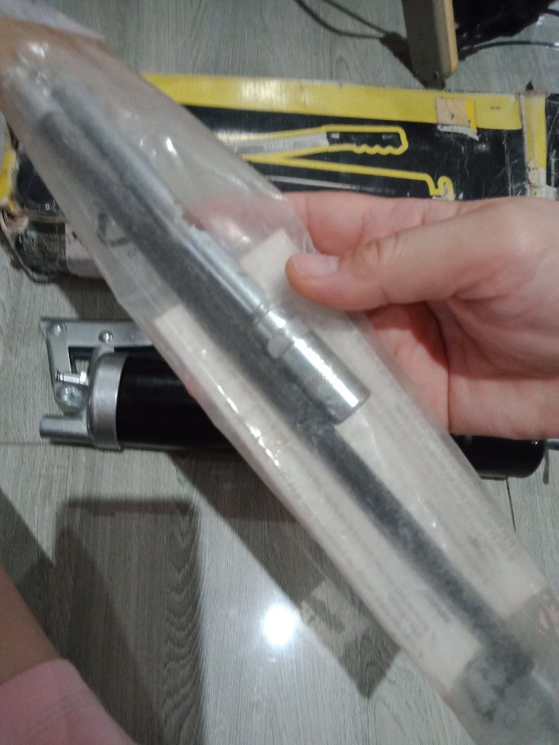 Stanley Grease Gun Original (Category: Construction Tools & Equipment) located in Manila. Submitted by PickClickShip (Listing ID 1318810058, Image 2). Description: Stanley Original Grease Gun Tool Set Original Stanley grease gun bought from US. Buy 1(complete set) @P800 or Buy 1(complete set) + Take 1 (without PSI hose) @P1100. 2nd unit with half handle (as shown in the picture) - brand Stanley - lower action grease - hose 4500psi working pressur
