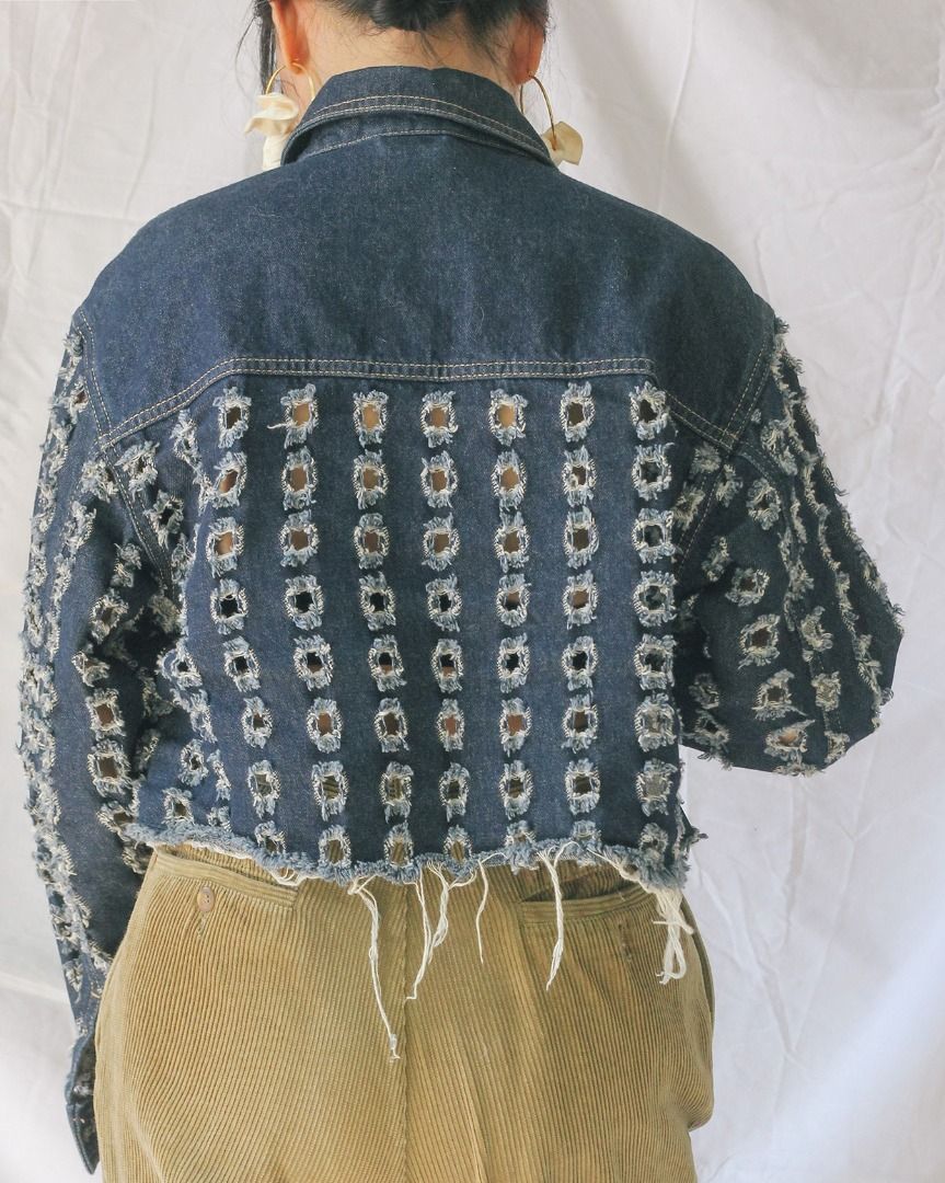 Topshop Cropped Distressed Denim Jacket (Category: Coats, Jackets and Outerwear) located in Manila. Submitted by teeforel (Listing ID 1318937920, Image 3). Description: Topshop Cropped Denim Jacket. Distressed bottom edges and square cut-outs. Still in very good condition. Size: 34/6/2 on tag (S-M) Shoulder = 17.5 inches Bust(Armpit to Armpit) = 21 inches Waist = 21 inches Length = 18 inches Model size is S-M. Height: 5’3’ *Color may vary from ac