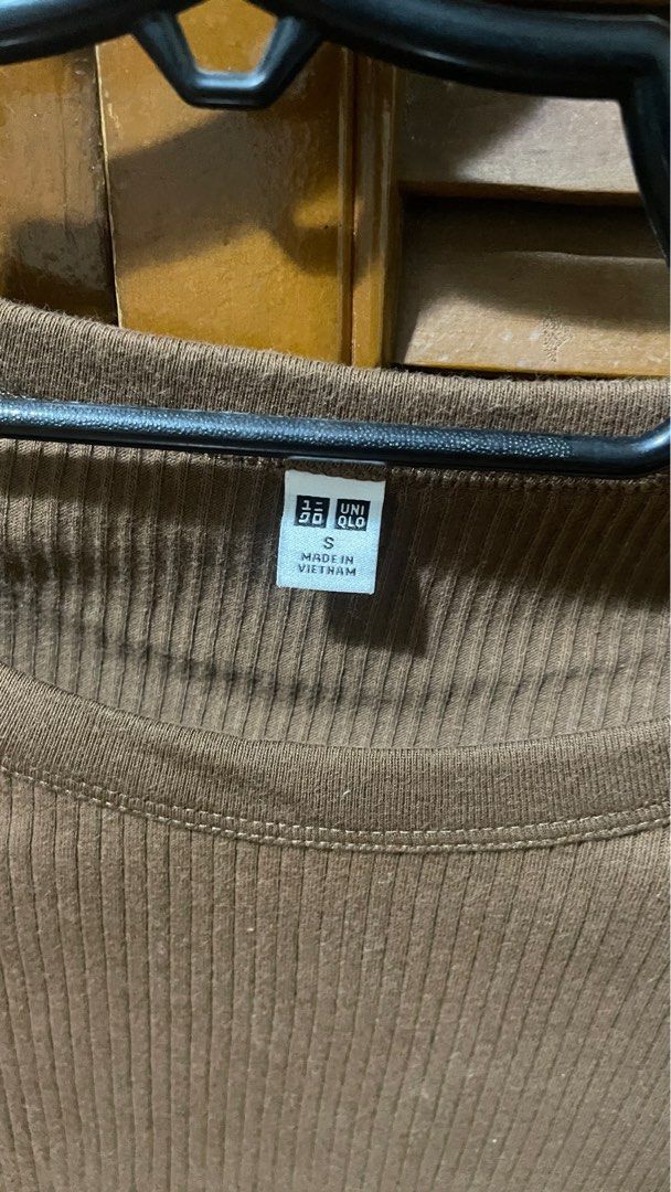 Uniqlo - knit shirt (Category: Shirts) located in Pasig City. Submitted by justmely (Listing ID 1318937653, Image 2). Description: Recently purchased, hindi po talaga bagay sakin brown huhu.