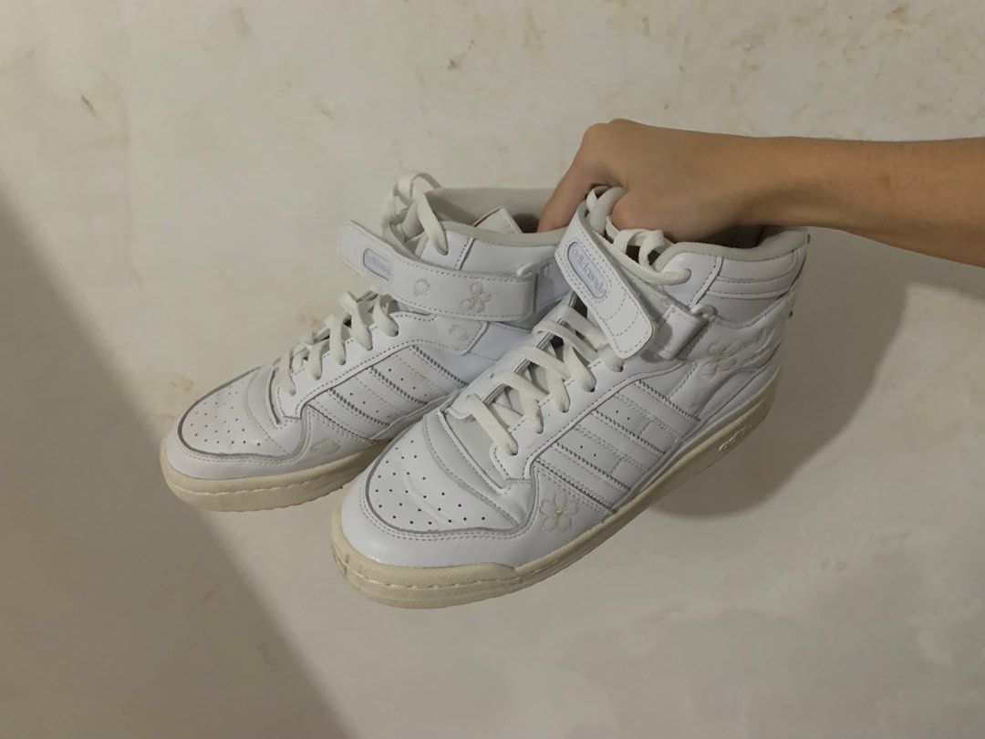 Adidas Forum Mid Hanami Size 42 (Category: Sneakers) located in Manila. Submitted by calevrs (Listing ID 1319000843, Image 1). Description: bnew, used once, bought from dubai, can send more pictures and videos upon inquiry - UV Reactive - with pink strings.