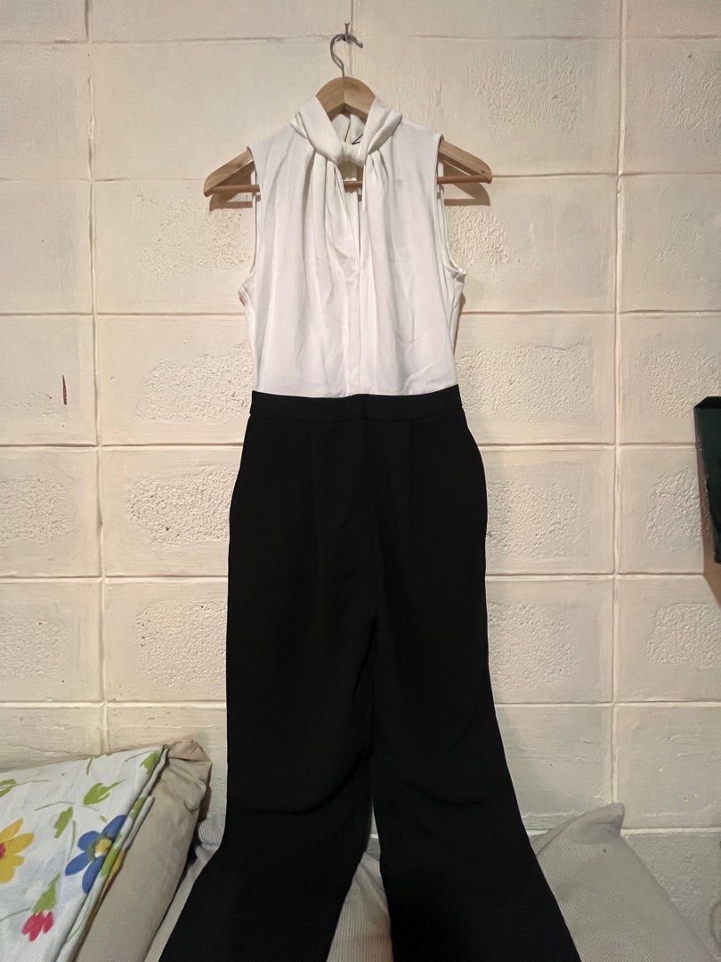 BNWT Mango jumpsuit for office wear (Category: Jumpsuits) located in Marikina City. Submitted by declutterisse (Listing ID 1319006490, Image 3). Description: Brand new with tag, bought for ₱1995. Only issue here is there's a bit of discoloration at the neck part (check photo). Otherwise, great for formal or office wear. Has a zipper closure at the back..