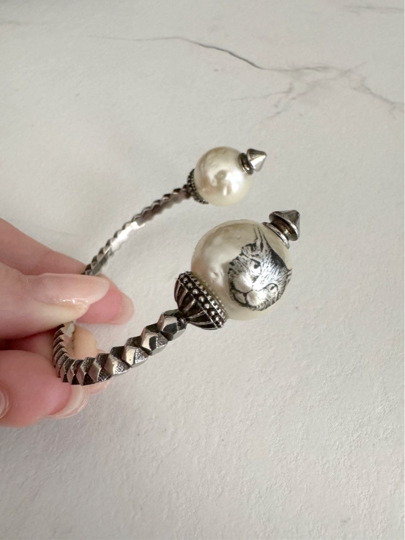 Gucci pearl cat bracelet Carousell