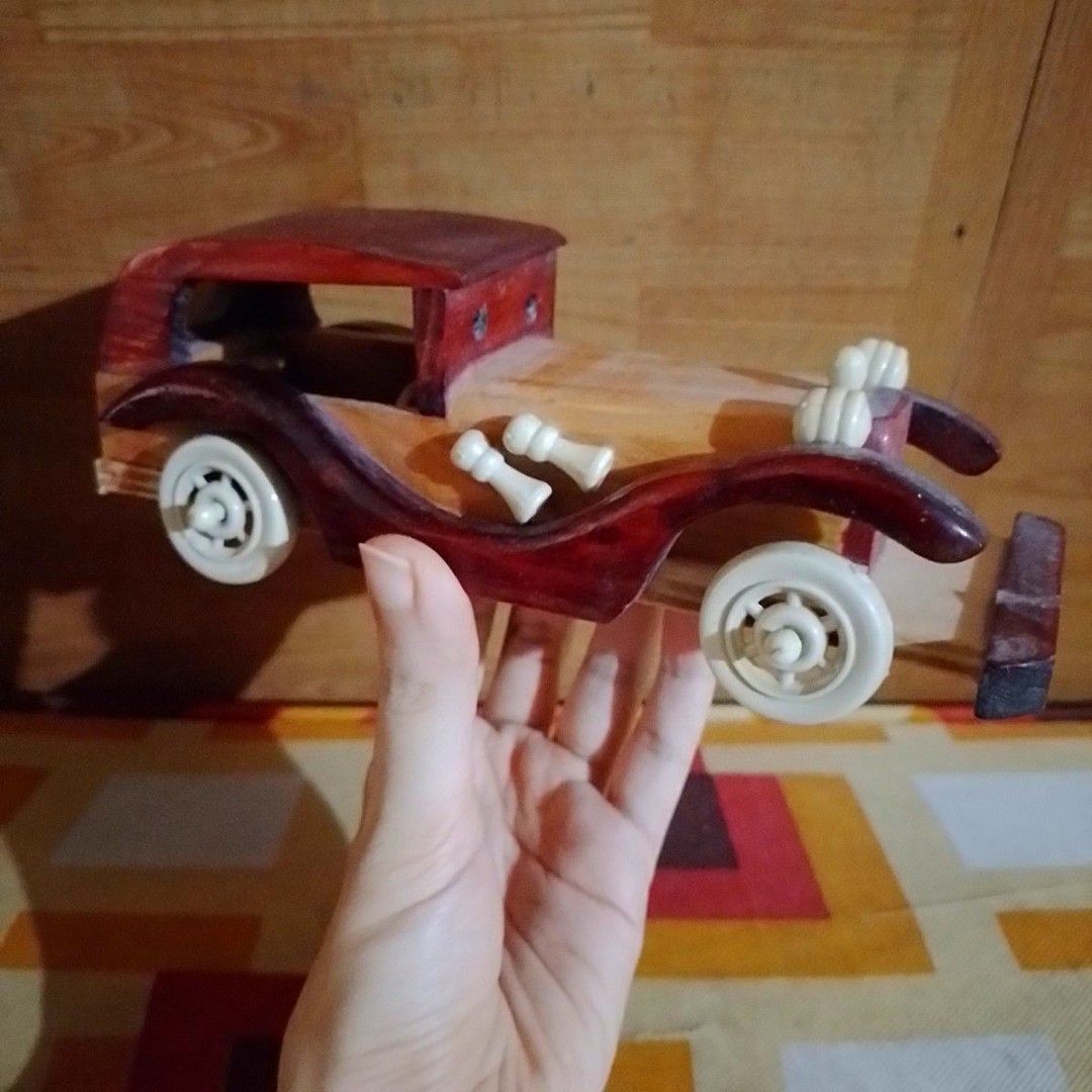 Wooden Vintage Car Display (Category: Other Home Decor) located in Bacoor. Submitted by hazirannei (Listing ID 1318983495, Image 2). Description: Wooden Vintage Car Display *broken back wheel cover at the right side *missing back bumper RfS: Decluttering MoP: GCash MoD: LBC Express or Buyer's preferred Courier if thru online booking. Shipping Fee at Buyer's expense..