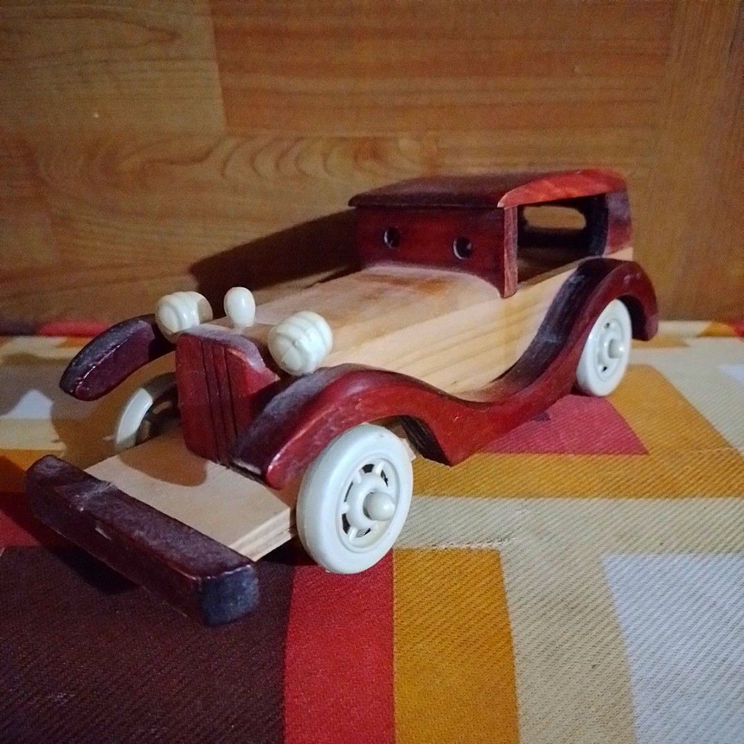 Wooden Vintage Car Display (Category: Other Home Decor) located in Bacoor. Submitted by hazirannei (Listing ID 1318983495, Image 3). Description: Wooden Vintage Car Display *broken back wheel cover at the right side *missing back bumper RfS: Decluttering MoP: GCash MoD: LBC Express or Buyer's preferred Courier if thru online booking. Shipping Fee at Buyer's expense..