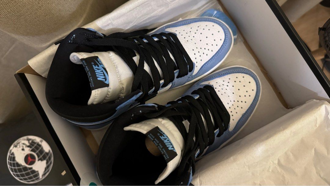 AUTHENTIC Air Jordan 1 High University Blue (Category: Sneakers) located in Manila. Submitted by blbtng (Listing ID 1323203779, Image 2). Description: 100% Authentic, with Receipt, Extra Laces, and Box Lightly Used, 9/10 Condition US 7.5 Mens, 9 Womens.