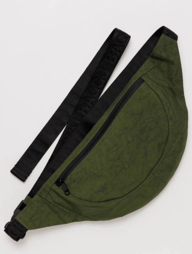 Baggu Crescent Fanny Pack - Bay Laurel (Category: Cross-body Bags) located in Davao. Submitted by my_picks (Listing ID 1323238903, Image 1). Description: Baggu Crescent Fanny Pack in Bay Laurel. Priced at ₱3,497 on the orange app. A streamlined heavyweight nylon crossbody with a sling shape that hugs the body. Wear across your body, over your shoulder or around your waist. Two main compartments Interior zip pocket Measures 6.5” × 17” × 2.5” 47” a