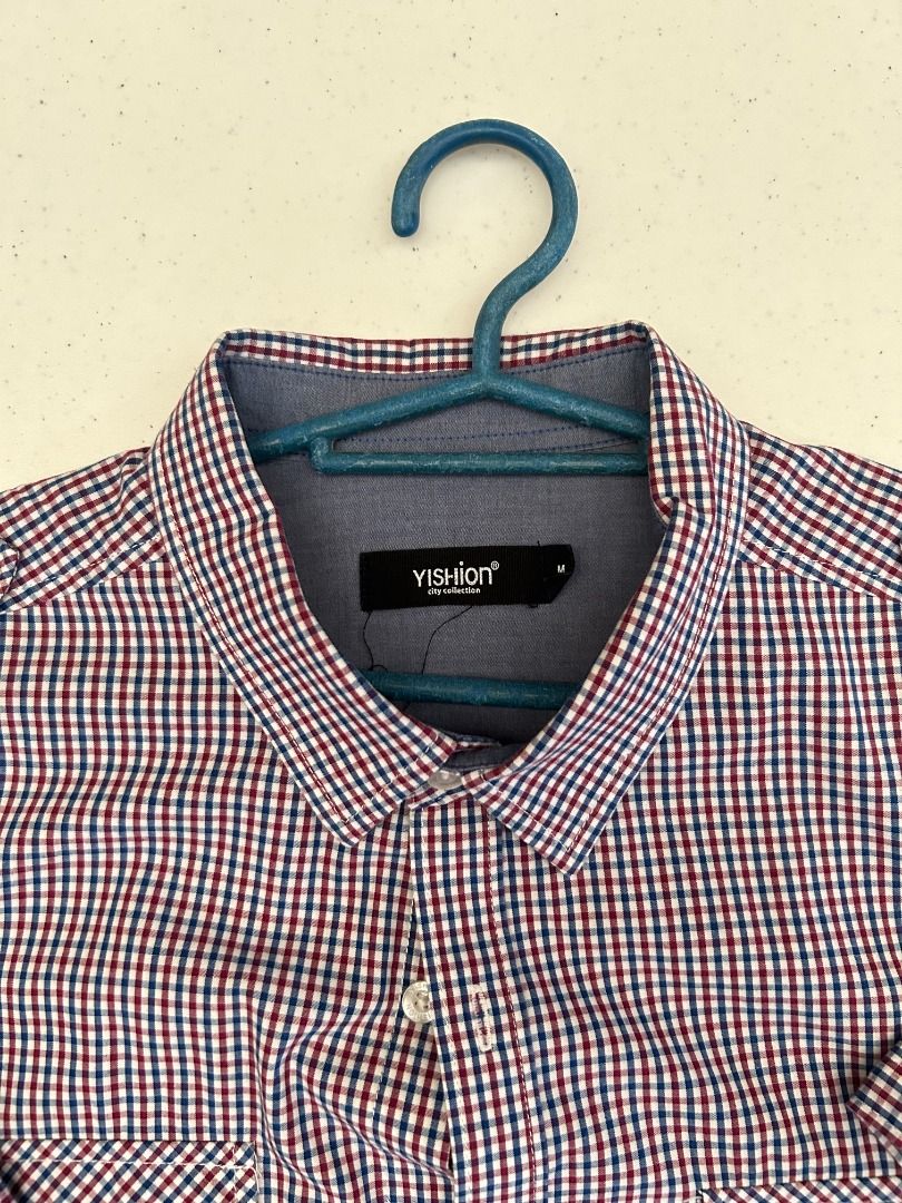 Blue and Red Checked Short Sleeved Polo (Category: Formal Shirts) located in Paranaque City. Submitted by togee8 (Listing ID 1323243419, Image 2). Description: PRE-LOVED Blue and Red Checked Short Sleeved Polo - Size M Brand: Yishion Fit: Regular Condition: 7/10 NO RETURNS/EXCHANGES NO MEETUPS Payment through GCash/Maya/BPI/Unionbank/Seabank Shipping through Grab Express/Lalamove/J&T PM or make an offer if interested. #Clothes #Thrift #UkayUkay #