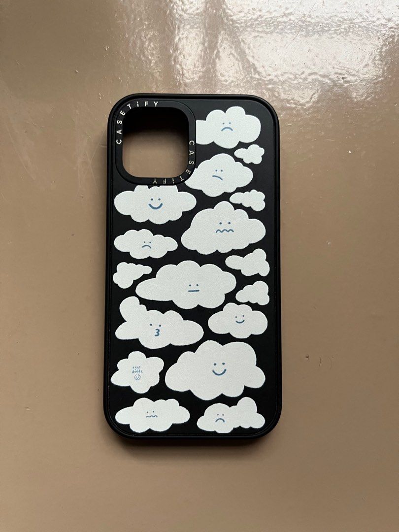 Casetify Cute Clouds Impact Case for iPhone 12 (Category: Cases & Sleeves) located in Quezon City. Submitted by kamilahdeclutters (Listing ID 1323163311, Image 2). Description: Casetify Cute Clouds Impact Case in Matte Black for iPhone 12 RFS: Not my style na 🥲 Super cute case Bought last November 2023 used for less than 6 months then stored .