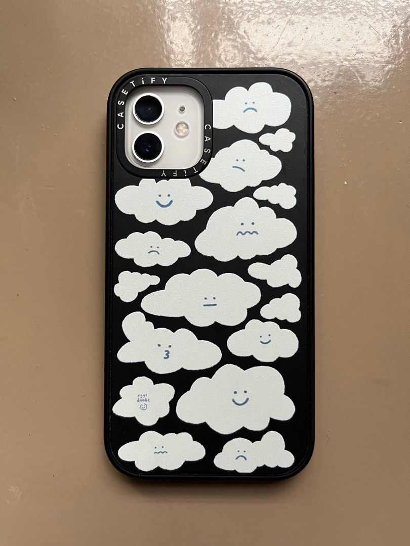 Casetify Cute Clouds Impact Case for iPhone 12 (Category: Cases & Sleeves) located in Quezon City. Submitted by kamilahdeclutters (Listing ID 1323163311, Image 1). Description: Casetify Cute Clouds Impact Case in Matte Black for iPhone 12 RFS: Not my style na 🥲 Super cute case Bought last November 2023 used for less than 6 months then stored .