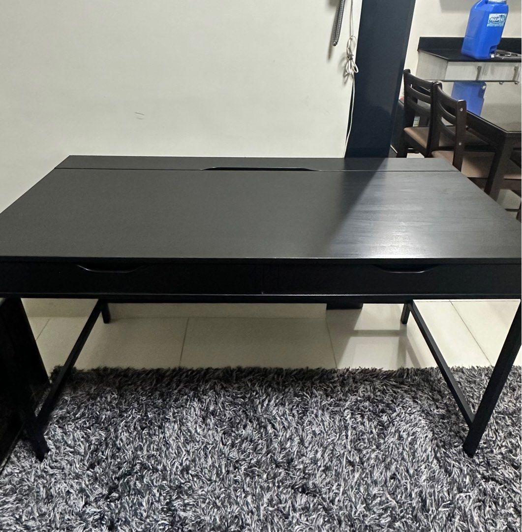 Ikea Study/Computer Desk (Category: Tables & Sets) located in Caloocan City. Submitted by shopmarxi (Listing ID 1323083893, Image 1). Description: - Ideal for home/office use! - Black-brown, 100x48 cm (39 3/8x18 7/8 “) - Original from IKEA - Like new, no issues - Swipe for detailed dimensions - RFS: Moving out! Loc: Taft Ave., Manila.