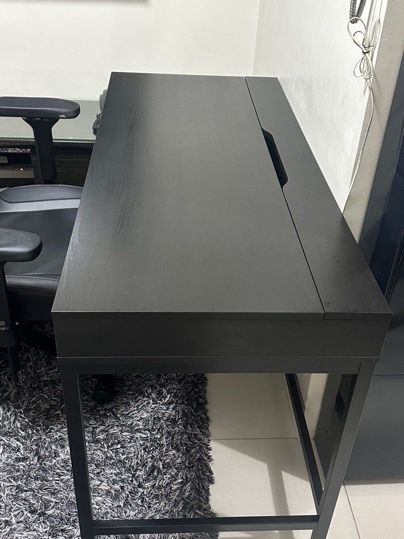 Ikea Study/Computer Desk (Category: Tables & Sets) located in Caloocan City. Submitted by shopmarxi (Listing ID 1323083893, Image 3). Description: - Ideal for home/office use! - Black-brown, 100x48 cm (39 3/8x18 7/8 “) - Original from IKEA - Like new, no issues - Swipe for detailed dimensions - RFS: Moving out! Loc: Taft Ave., Manila.