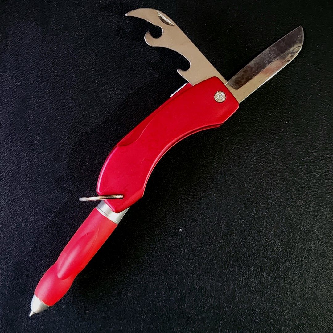 Multitool Keychain (Category: Travel Essentials & Accessories) located in Pasig City. Submitted by ge_borro (Listing ID 1323168039, Image 1). Description: • never used • working flashlight, pen, knife, bottle opener • comes in box.