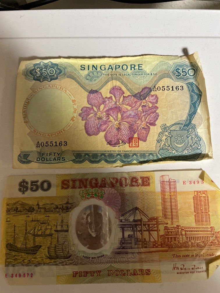 Old $50 notes (2 different version) (Category: Currency) located in Singapore. Submitted by simon_cx (Listing ID 1323212783, Image 1). Description: Just found some antique. Hard to maintain or restore to good condition. Hence, letting go at reasonable offer. .
