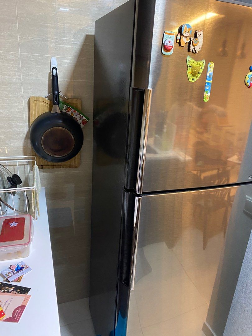 Sharp Fridge (Category: Refrigerators & Freezers) located in Singapore. Submitted by wkyap (Listing ID 1323237793, Image 1). Description: Used for 10 months only. Still under 2 years warranty. Like new. Moving out sale Delivery can be arranged .