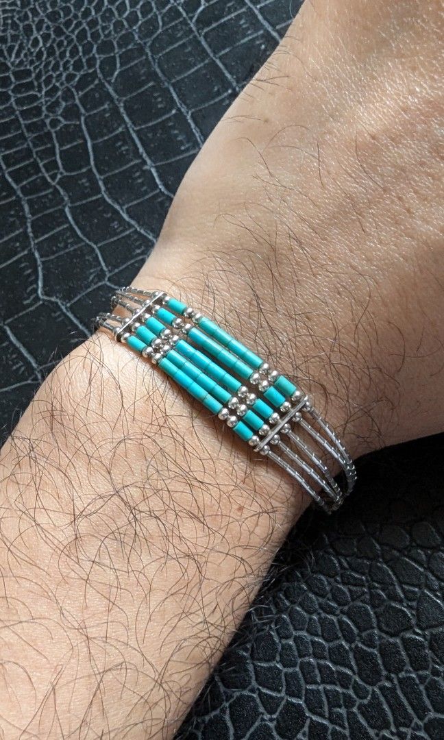 Turquoise bracelet with liquid silver (Category: Luxury Accessories) located in Cavite. Submitted by luckygingerivy (Listing ID 1323086046, Image 1). Description: Vintage Native American, authentic turquoise liquid sterling silver. 7 1/2 inches wrist..