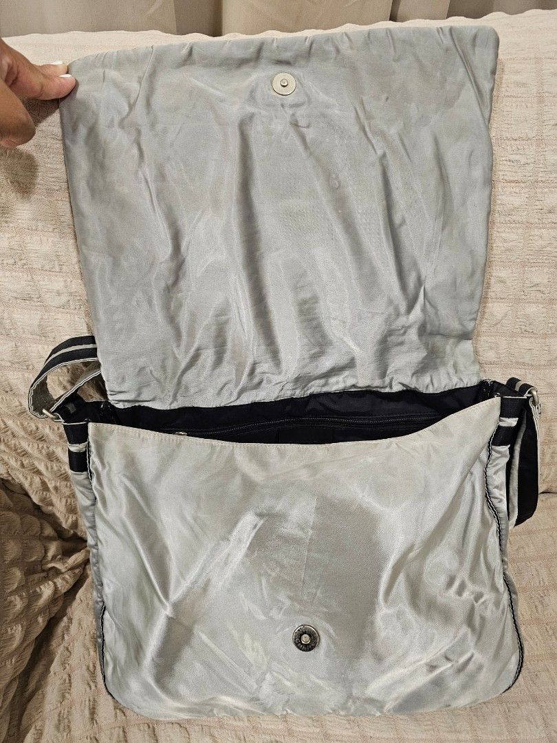 Authentic Chanel Nylon Messenger Bag (Category: Luxury Bags & Wallets) located in Paoay. Submitted by ysmattic (Listing ID 1324869066, Image 3). Description: 100% guaranteed authentic CC Sport Nylon Messenger bag. — Holo intact, series 10. — Will fit 13" laptop. — Needs deep cleaning, no flaws. — Unisex..