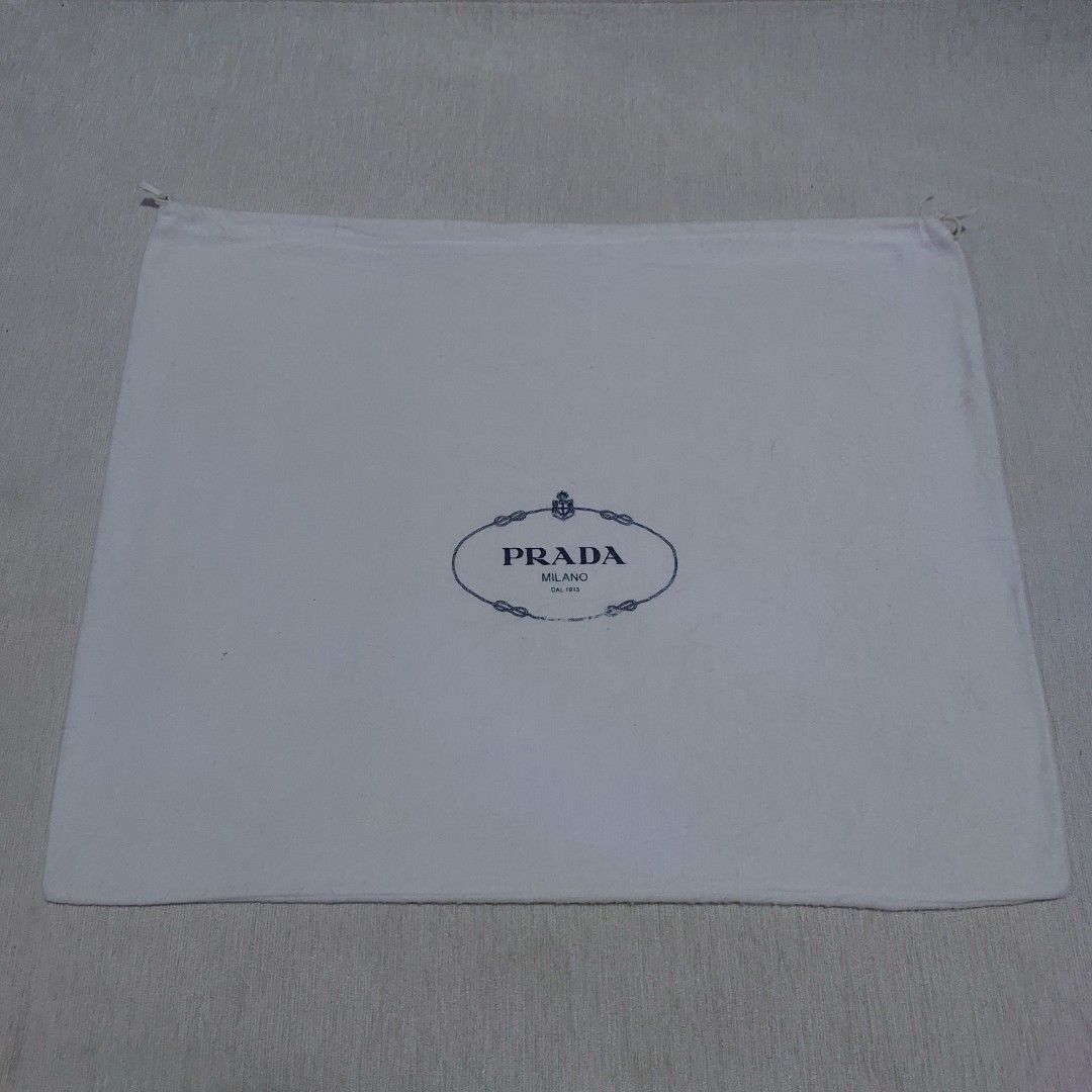 Authentic Prada dust bag 18x22.5 inches (Category: Luxury Bags & Wallets) located in Manila. Submitted by jfluxury.co (Listing ID 1324807330, Image 2). Description: excellent condition no flaws bought in Japan 🇯🇵 💯% Authentic. 😊 Money back guarantee. 😊 Clean and ready to use na po.