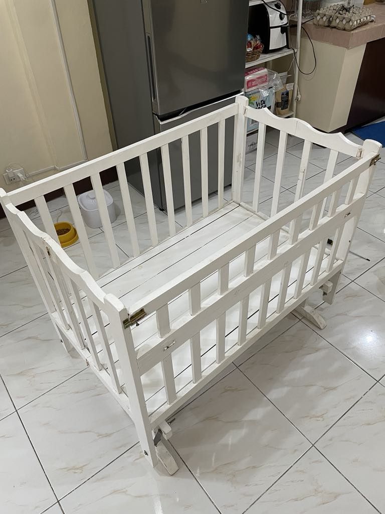 Crib with Rocker, foam and changing station (Category: Cots & Cribs) located in Pasig City. Submitted by jhondanerymiciano (Listing ID 1324782978, Image 1). Description: Our baby outgrew the crib. You'll get tge following: 1. crib 2. rocker attachement 3. Foam and side foam 4. Chaging station attachement.